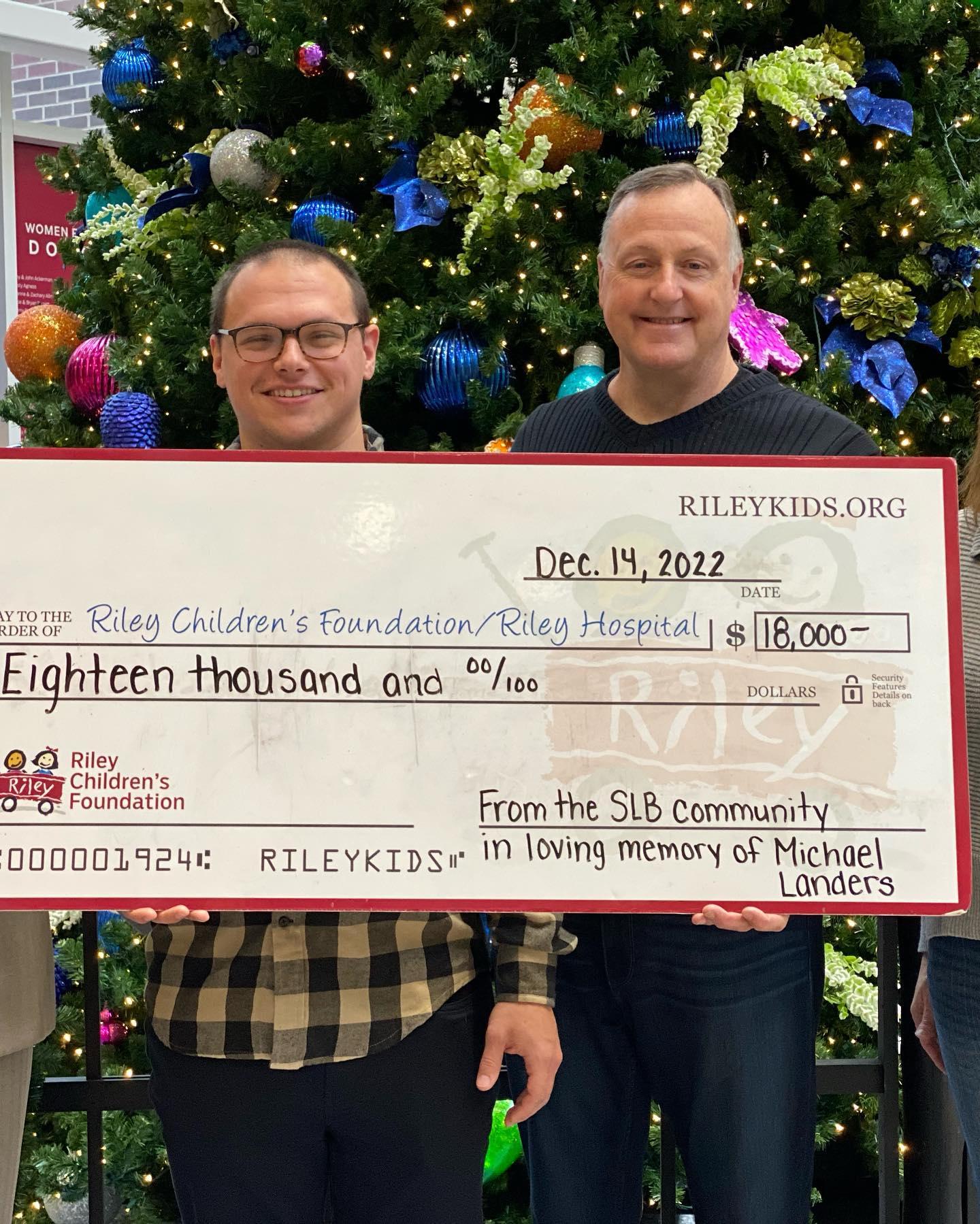 SLB Cares presenting a $18,000 check to Riley Children's Hospital in 2022